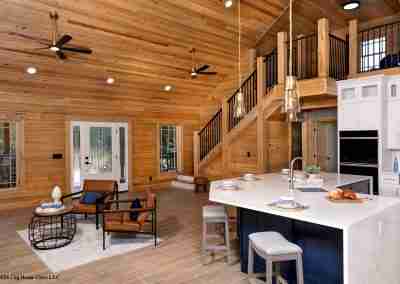 Spacious log cabin interior with modern kitchen